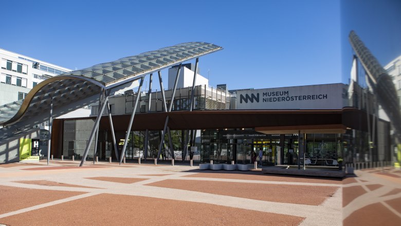 Entrance to the Museum of Lower Austria with modern architecture and glass roof.